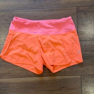 Lululemon Neon Pink running shorts